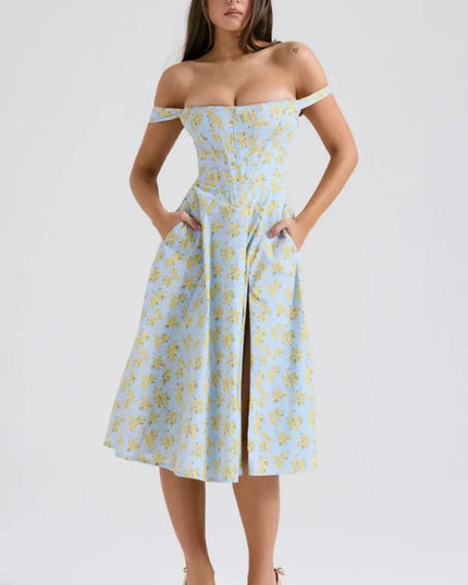 Front view of a blue floral off shoulder midi dress with slit and pockets