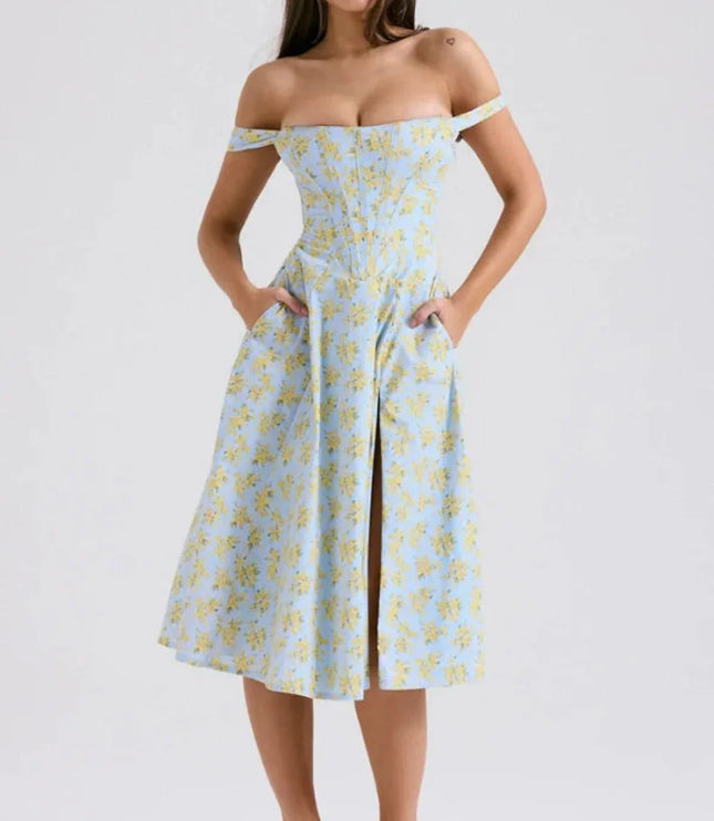Front view of a blue floral off shoulder midi dress with slit and pockets