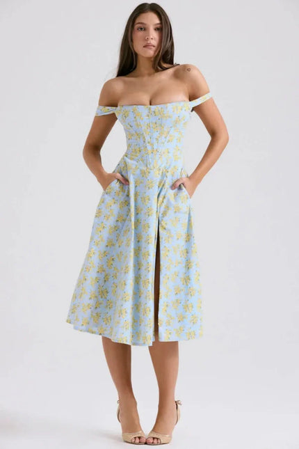 Front view of a blue floral off shoulder midi dress with slit and pockets