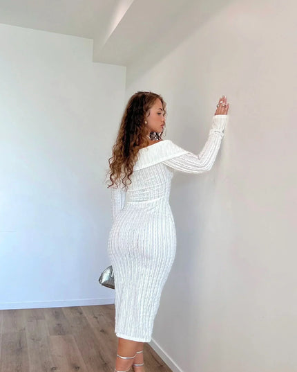 Back view of white off shoulder long sleeve midi dress with fitted ribbed fabric