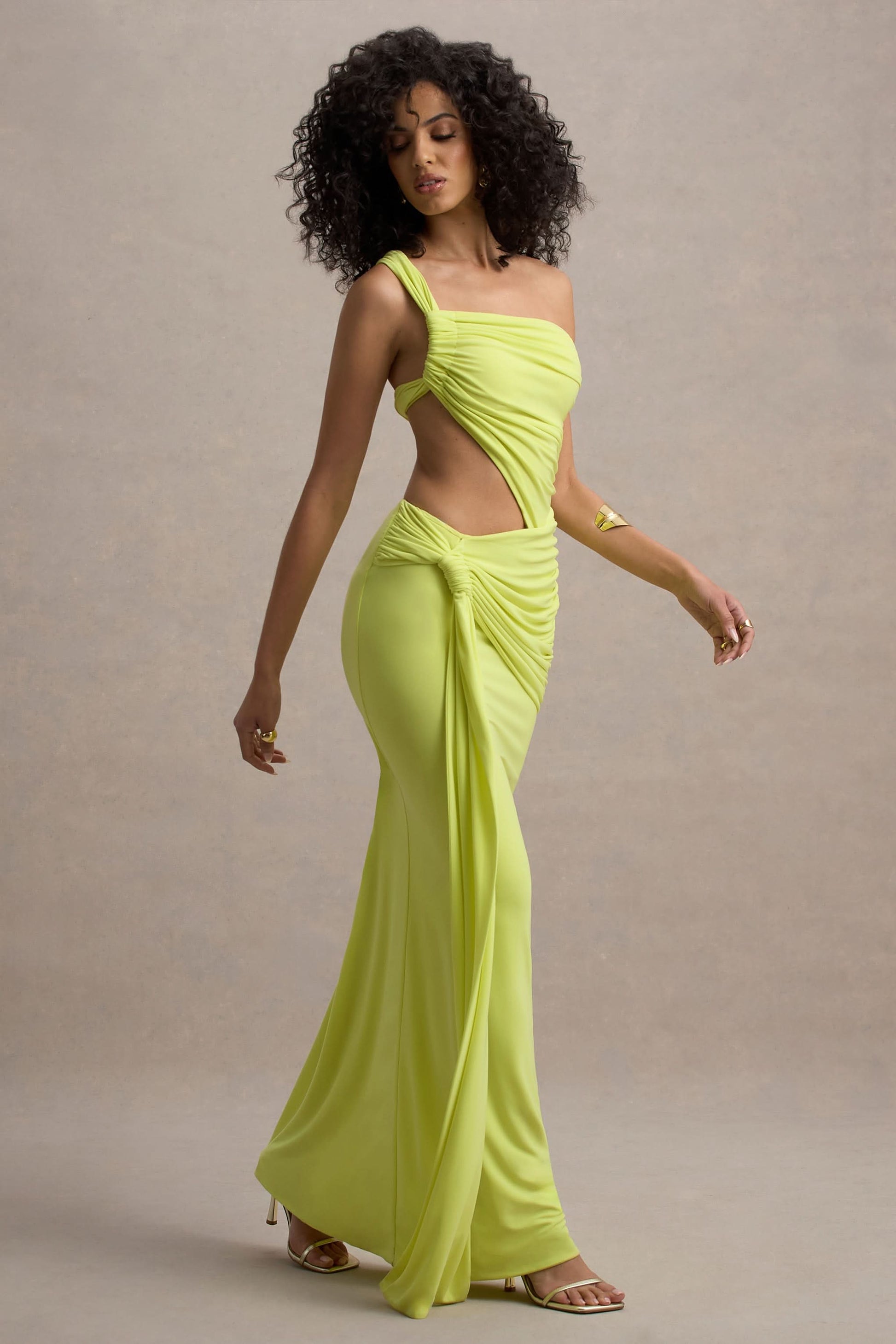 Front view of lime green summer dress with asymmetrical strap and high side cutout