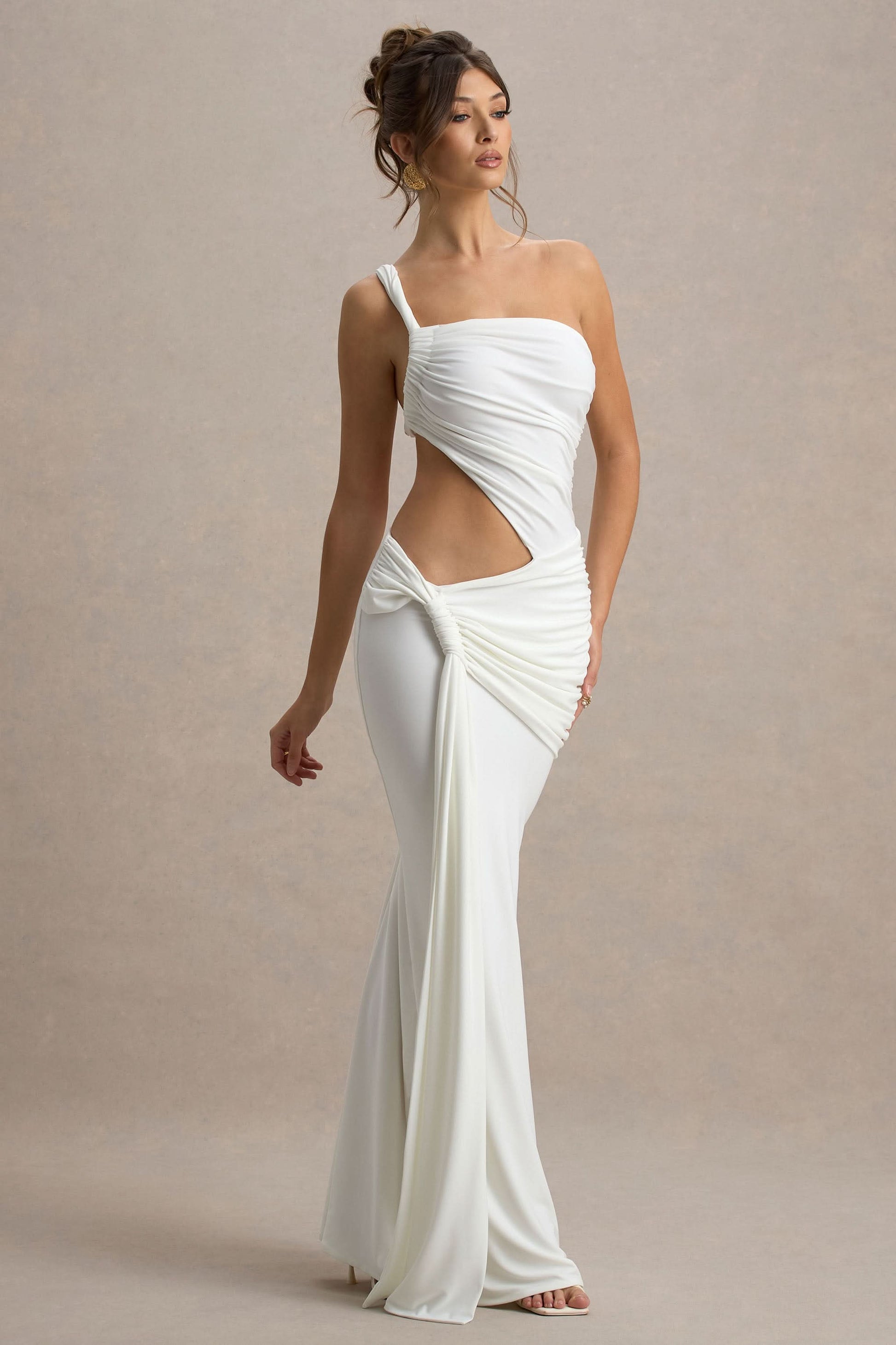 White one shoulder maxi dress with side cutout and ruched draping at the waist