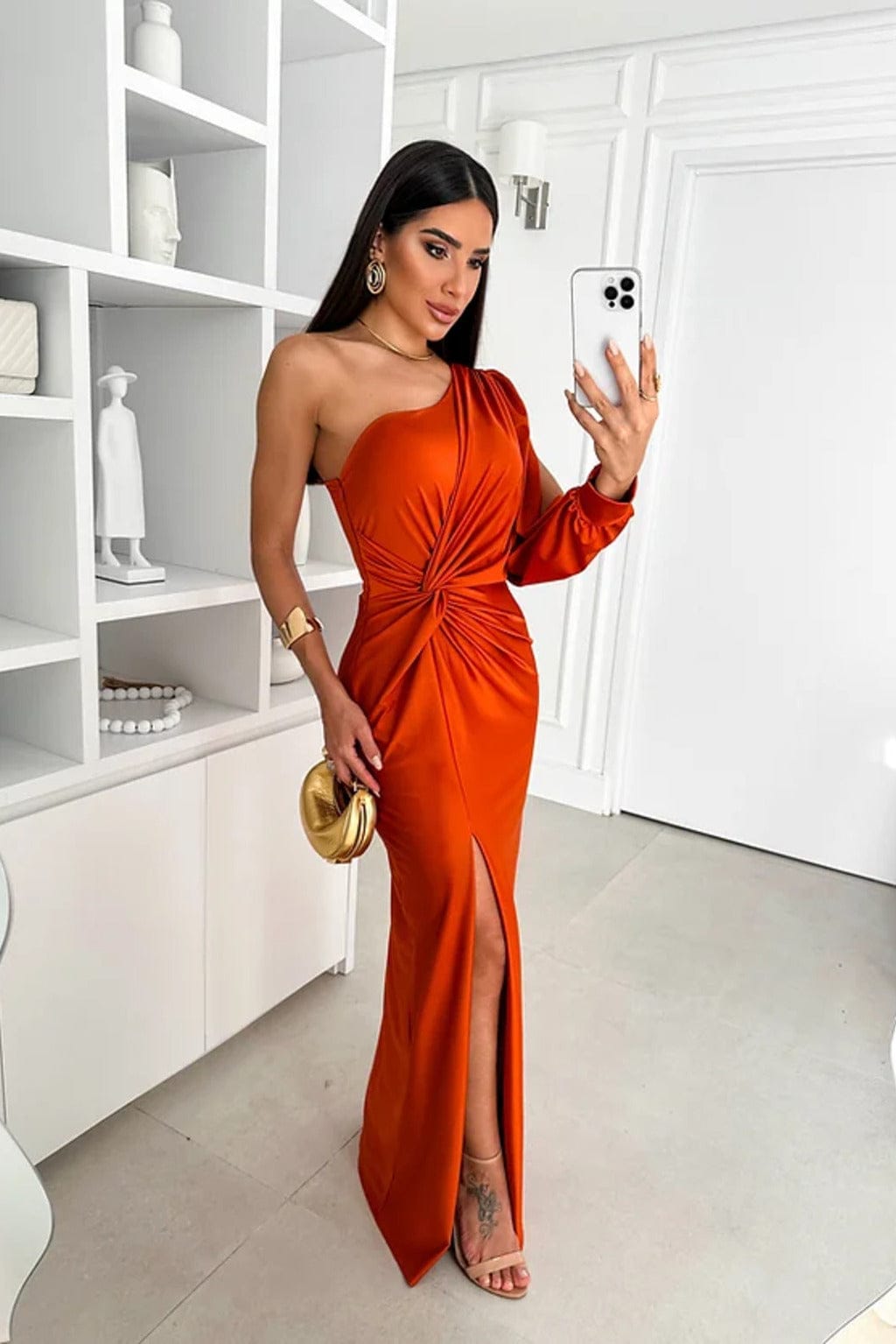 Orange one shoulder satin maxi dress with long sleeve and front slit