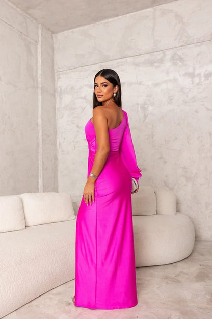 Back view of magenta satin maxi dress with one shoulder and fitted silhouette