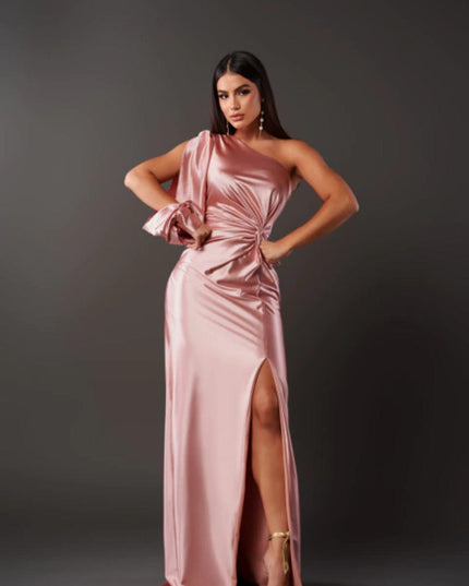 Front view of blush pink satin maxi dress with one shoulder and high slit