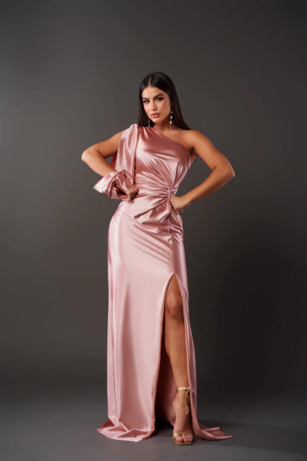Front view of blush pink satin maxi dress with one shoulder and high slit