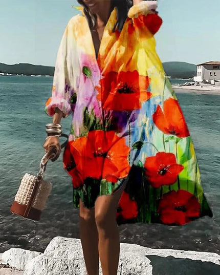 White beach mini shirt dress with large red poppy floral print and relaxed long-sleeve design