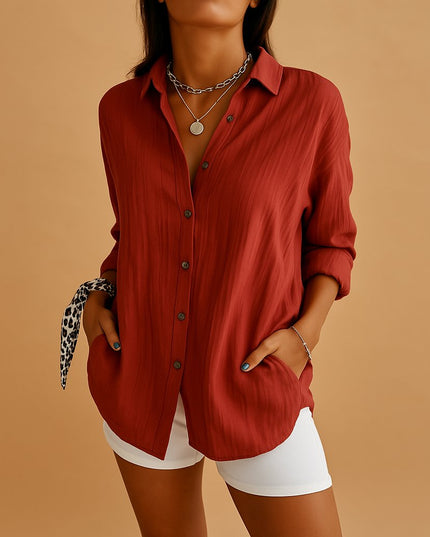 Red linen button down long sleeve shirt with relaxed fit and rolled sleeves