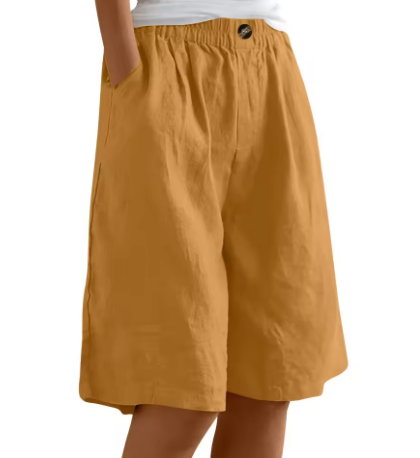 Mustard yellow women summer Bermuda shorts with elastic waist, button closure, and loose legs