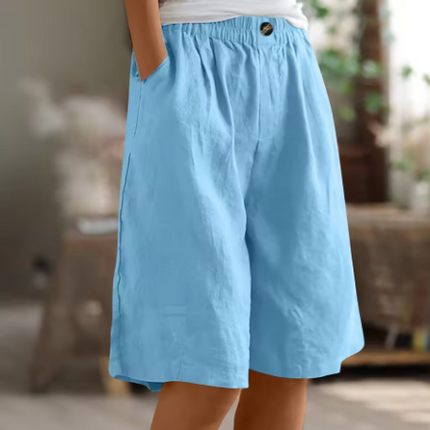 Sky blue women Bermuda shorts with elastic waist, relaxed wide leg cut and side pockets for summer
