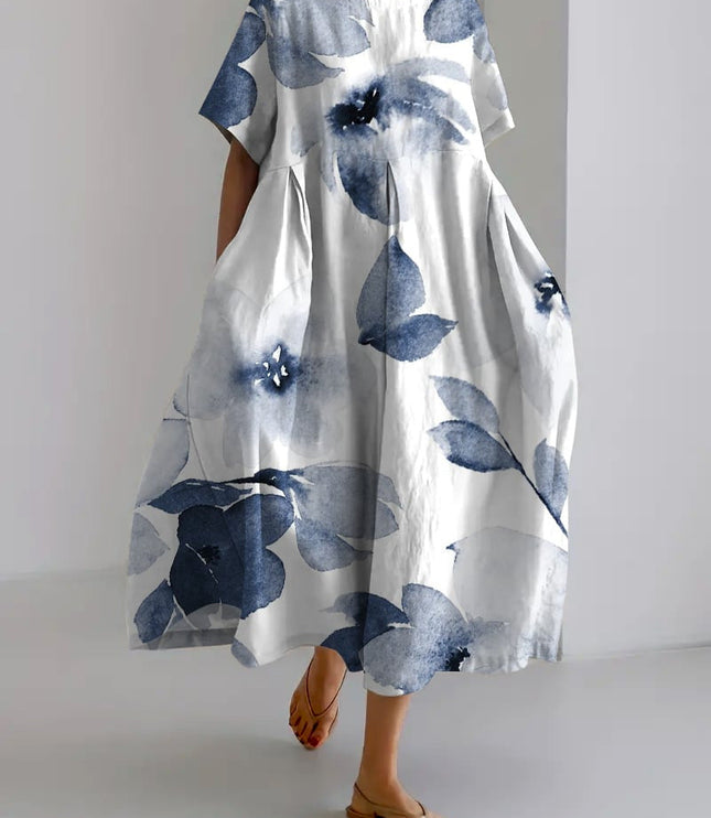 White midi dress with oversized blue floral print, breezy short sleeve summer dress