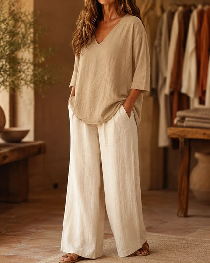 Women's Relaxed V-Neck 3/4 Sleeve Curved Hem Blouse