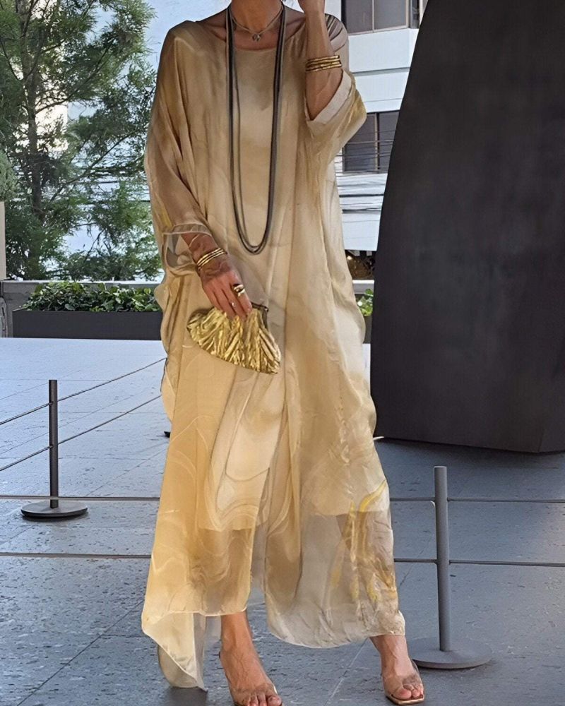 Beige abstract print maxi dress with sheer fabric and relaxed vacation silhouette