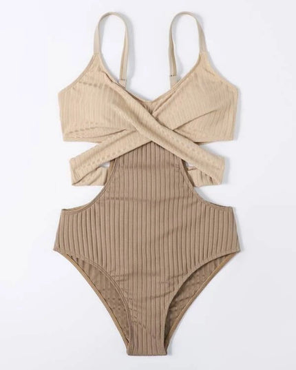 Front view of beige ribbed one piece swimsuit with thin straps and wrap style cut out design