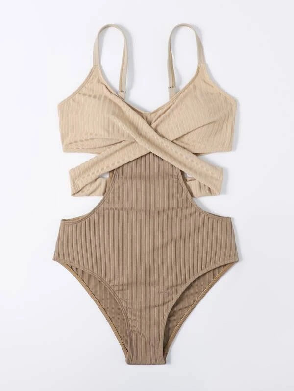 Front view of beige ribbed one piece swimsuit with thin straps and wrap style cut out design