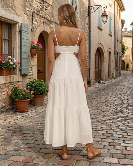Back view of white summer maxi dress with thin straps and cutout waist detail