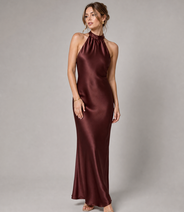 Side angle of burgundy cocktail satin halter midi dress showing smooth drape and fit