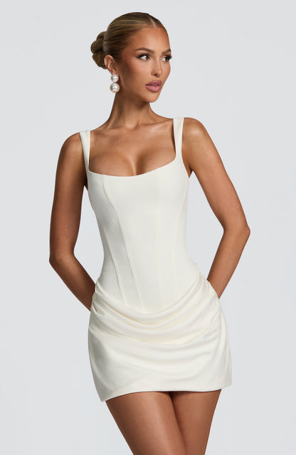 Ivory satin mini dress with square neckline and draped skirt, front view
