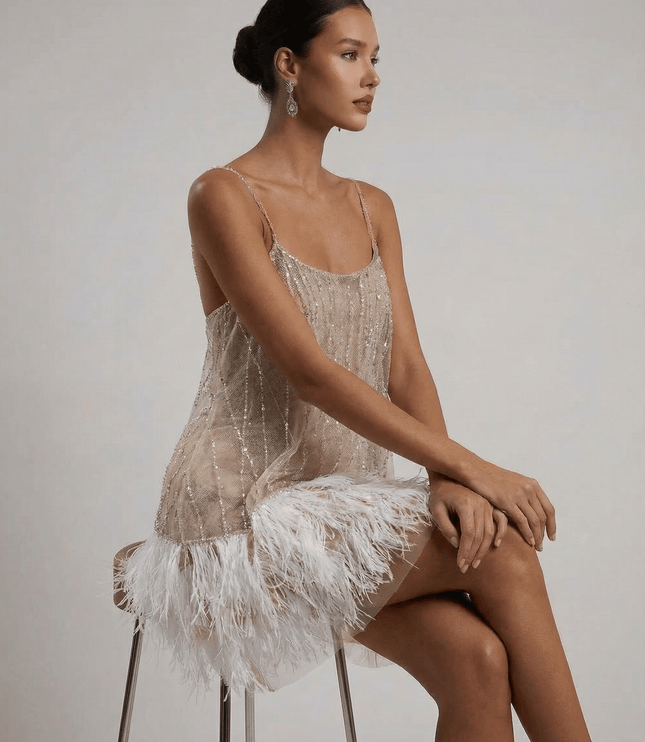 Women's Sequin Mini Dress with an Open Back and Feather Hem