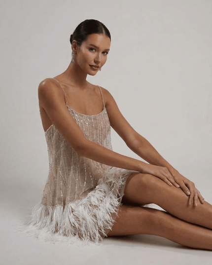 Women's Sequin Mini Dress with an Open Back and Feather Hem