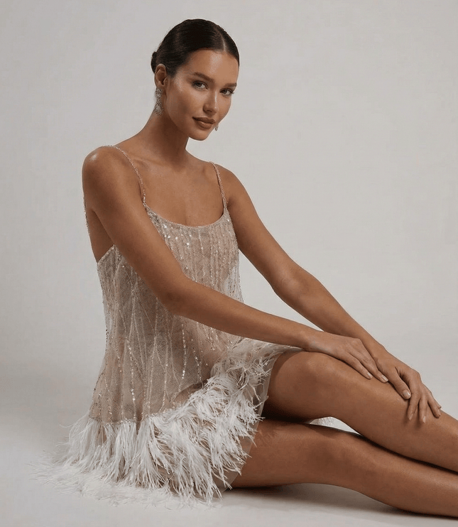 Women's Sequin Mini Dress with an Open Back and Feather Hem