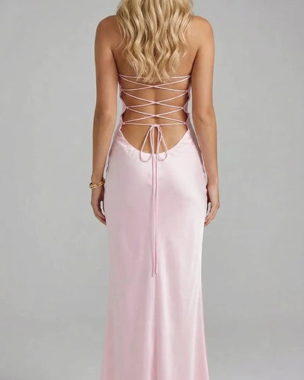 Rear view of pink spaghetti strap maxi dress with crisscross back lacing