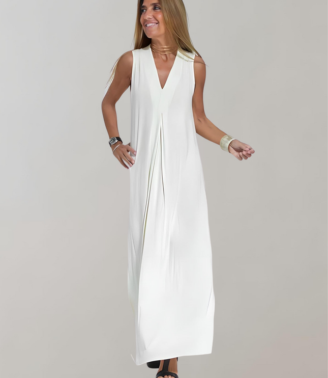 White sleeveless maxi dress with deep V-neck and front pleat detail, summer dress