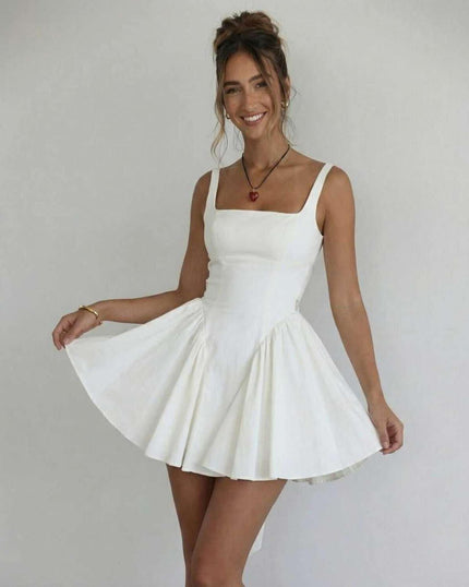 White square neck mini dress with wide straps and flared skirt for a wedding guest look