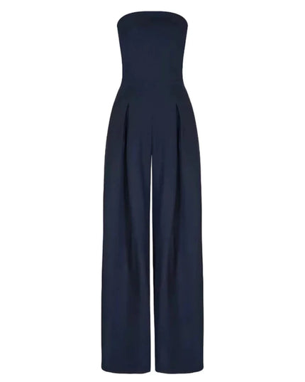 Front view of a navy strapless jumpsuit with pleated wide leg pants and clean neckline