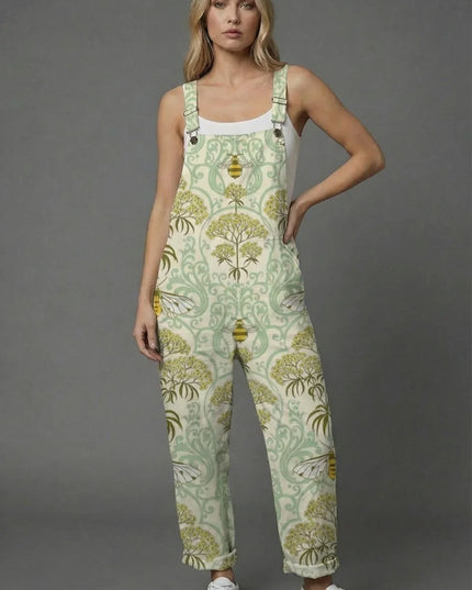 Side profile of botanical print women romper in sage green with straight-leg silhouette