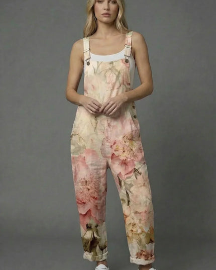 Green textured wide leg romper with raised floral details and a relaxed sleeveless fit