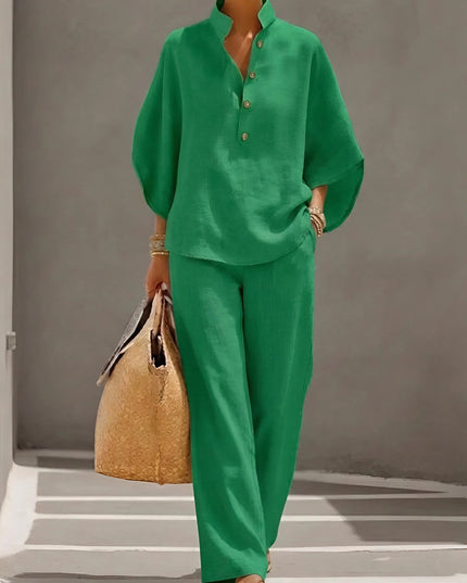 Green summer two piece set with loose button up shirt top and wide leg pants
