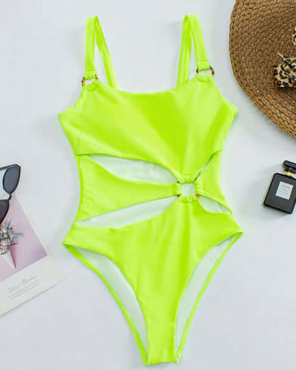 Neon green cut out one piece swimsuit laid flat with side ring detail and high leg