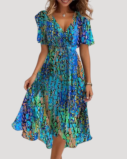 Blue and green floral wrap midi dress with short flutter sleeves and flowy skirt