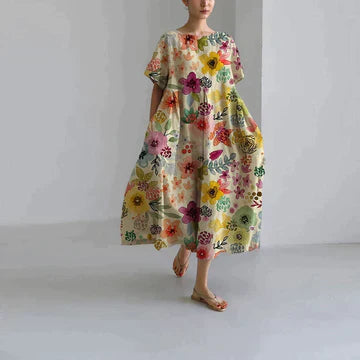 Cream midi dress with multicolor floral print, loose short sleeves, relaxed summer dress