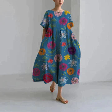 Blue midi dress with colorful floral print, short sleeves, loose fit summer dress