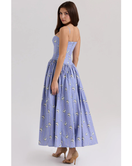 Side back view of lavender floral maxi dress showing fitted bodice and flared skirt