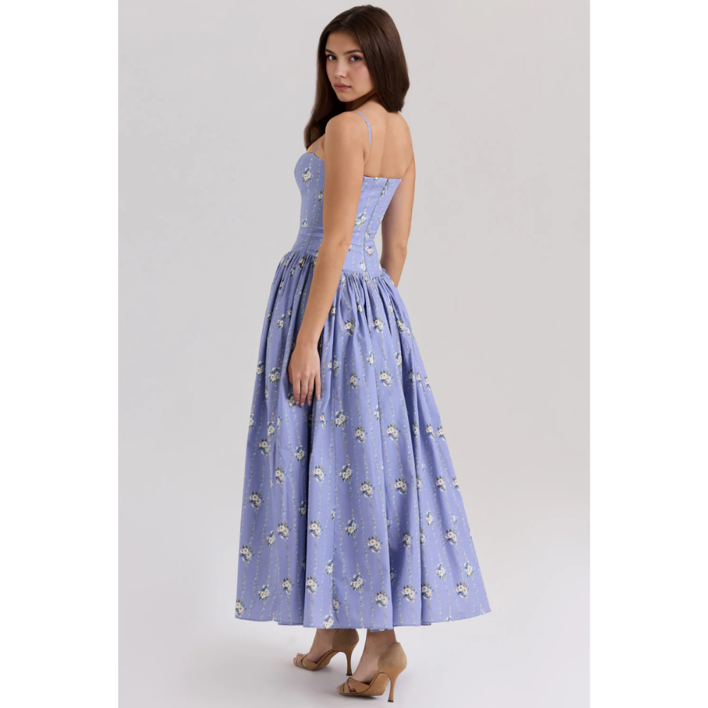 Side back view of lavender floral maxi dress showing fitted bodice and flared skirt
