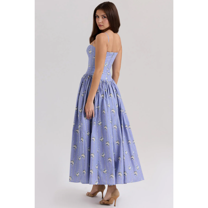 Side back view of lavender floral maxi dress showing fitted bodice and flared skirt