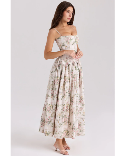 Floral maxi dress with square neckline, straps, and softly pleated skirt