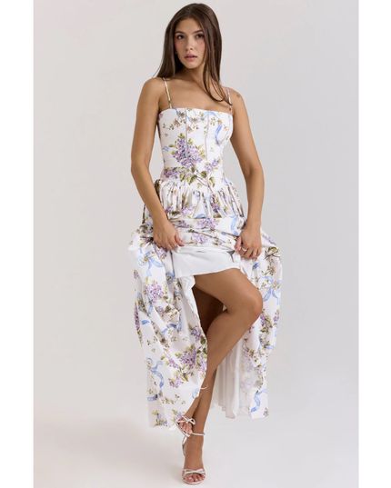 Women's floral maxi dress with square neckline, thin straps, and gathered skirt in white