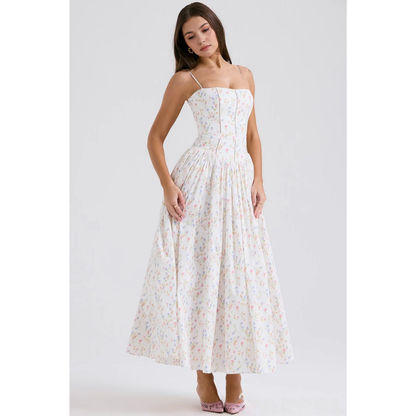 Front view of pastel floral summer dress with fitted bodice and wide maxi skirt