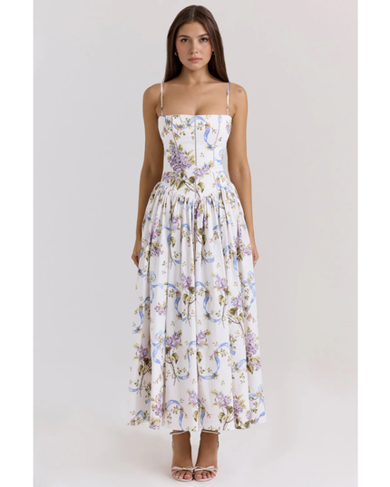 Women's floral maxi dress with spaghetti straps, fitted bodice, and full skirt in white