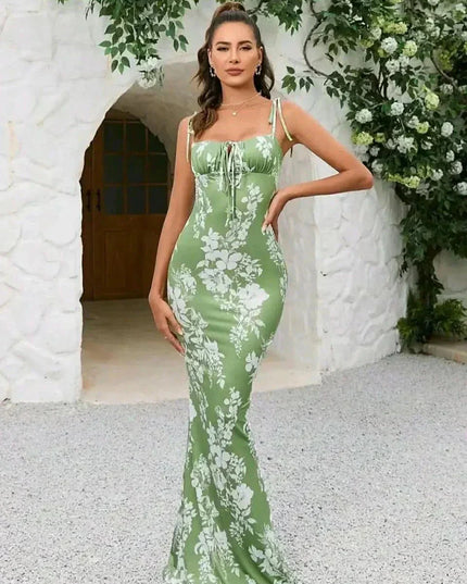 Green floral square neck maxi dress with tie straps and ruched bust in a fitted summer style