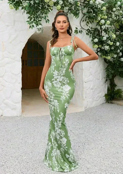 Green floral square neck maxi dress with tie straps and ruched bust in a fitted summer style