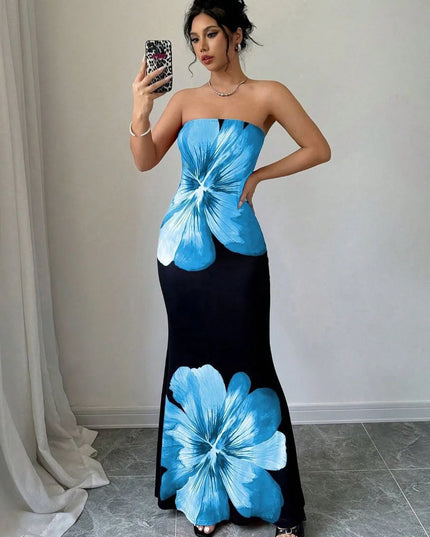 Woman wearing blue floral strapless maxi dress with black skirt and large flower print