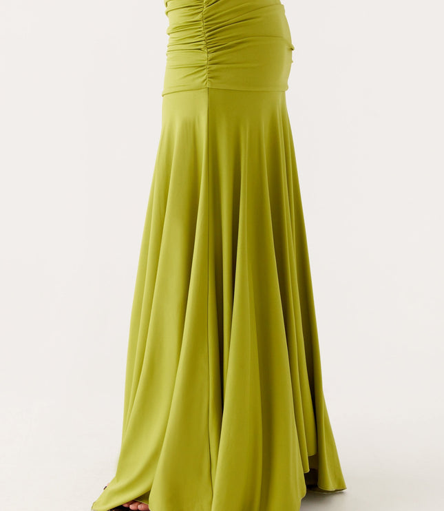 Close-up side view of lime green ruched waist maxi dress with smooth boat neck neckline