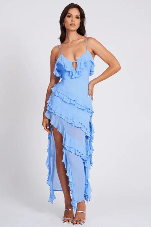 Light blue summer dress with spaghetti straps, ruffle trim, and thigh-high slit