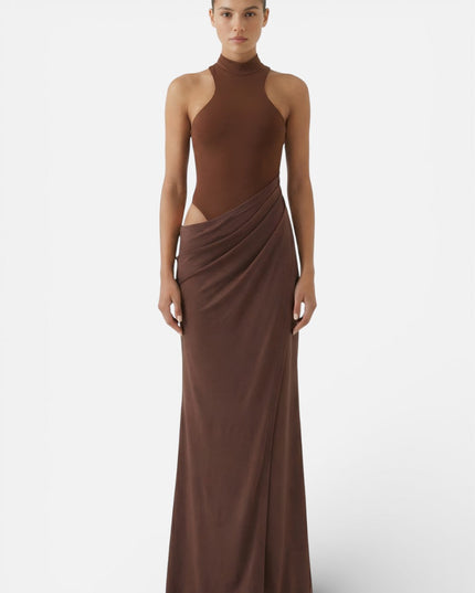 Front view of brown halter cut out maxi dress with fitted bodice and long skirt