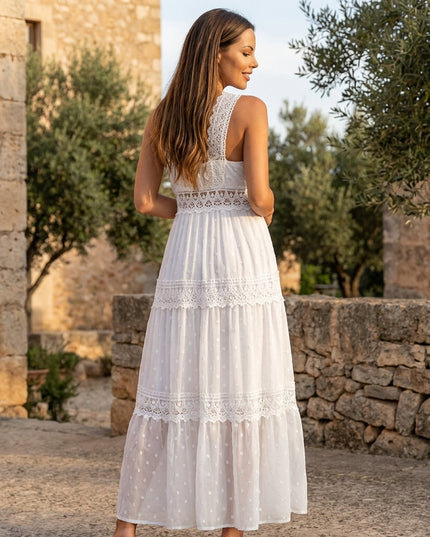 Back view of white floral maxi dress with lace straps and tiered sheer skirt